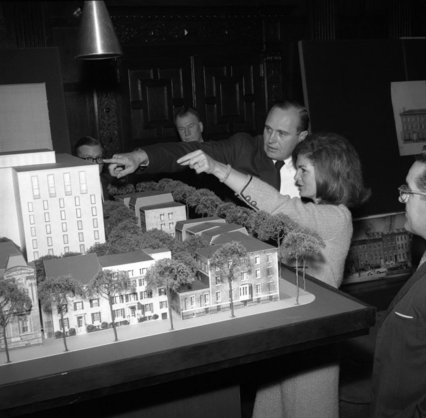 Jackie Kennedy looking at model