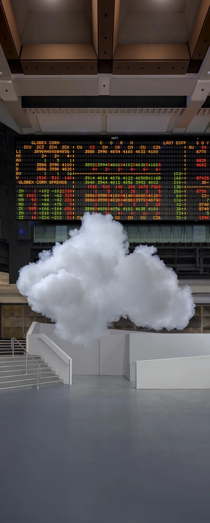 An image of a cloud in front of a numeric screen