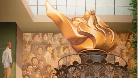 A photo of the Beacon of Hope - Faces of America mural