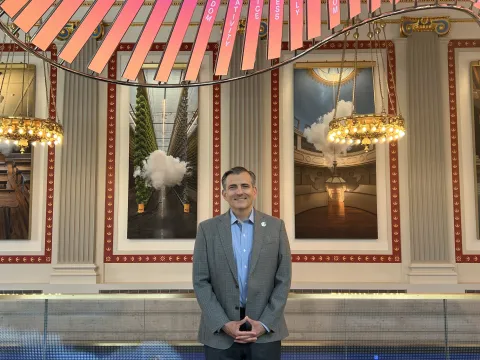 David Trulio in front of the Word Cloud.